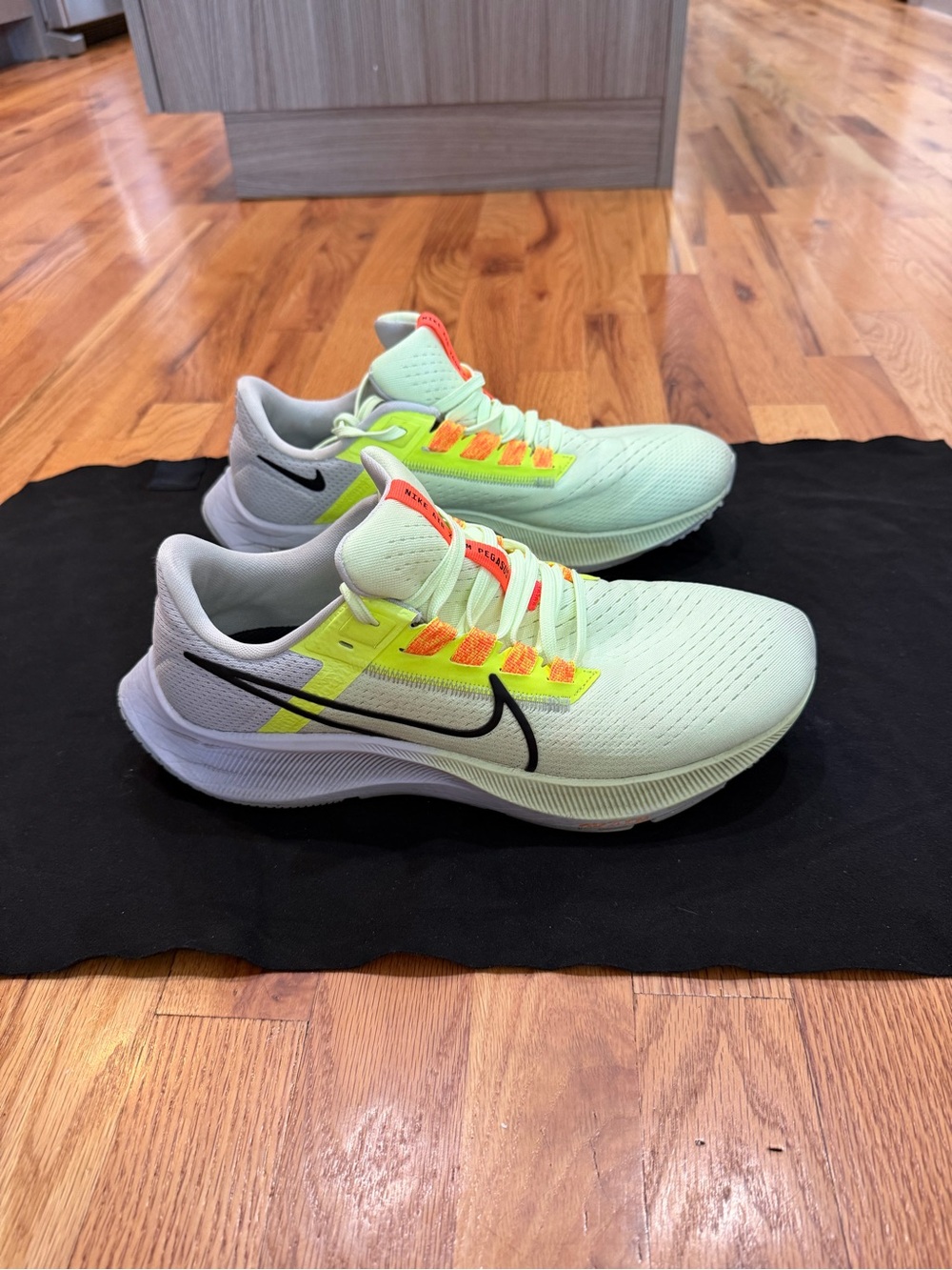 Nike Mint Green Running Shoes with Neon Yellow & Orange Accent